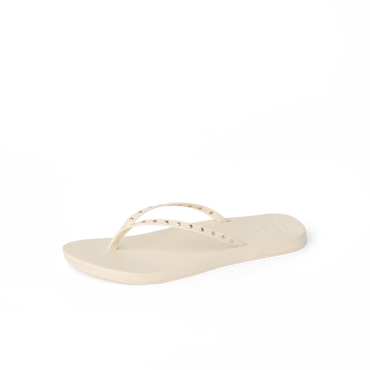 Cushion Slim Studs women's sandal facing left, featuring soft-rebound cushioning and studded straps for beach comfort.