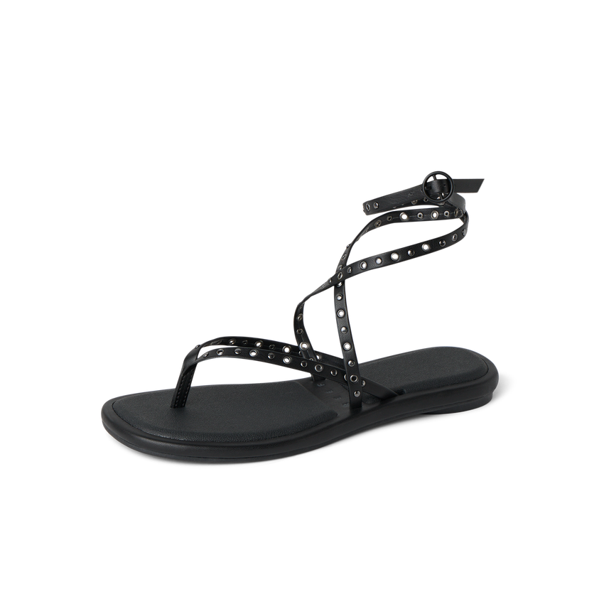 Willow Quinn Studs black sandal facing left, close-up of straps with stud details and cushioned sole, beach-inspired comfort.