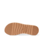 Close up of Playa Bella flip flop outsole facing up with toe pointing left and textured traction grooves