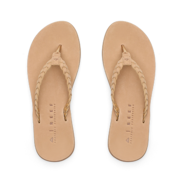 Playa Bella braided strap flip flops facing upward with cushioned footbeds and arch support