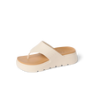 Cali Laguna sandal facing right, close-up of platform toe post with extra cushioning and arch support in white.