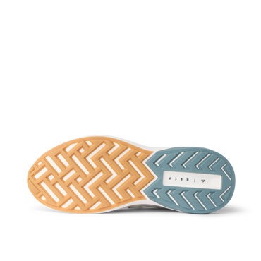 Reef Zuma sneaker outsole close up, facing left, with textured herringbone traction and cushioned sole