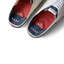 Top view close-up of Neptune Lido men's shoes showing red cushioned insoles, navy heel area, and white laces facing upward.