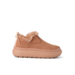 Side view of a tan slip-on shoe facing right with plush lining and thick cushioned sole for beach comfort.
