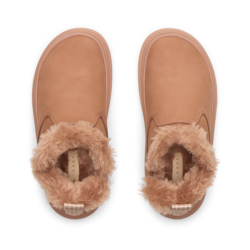 Top view of tan slip-on shoes with soft, fluffy inner lining and rounded toe, designed for comfort and casual wear.