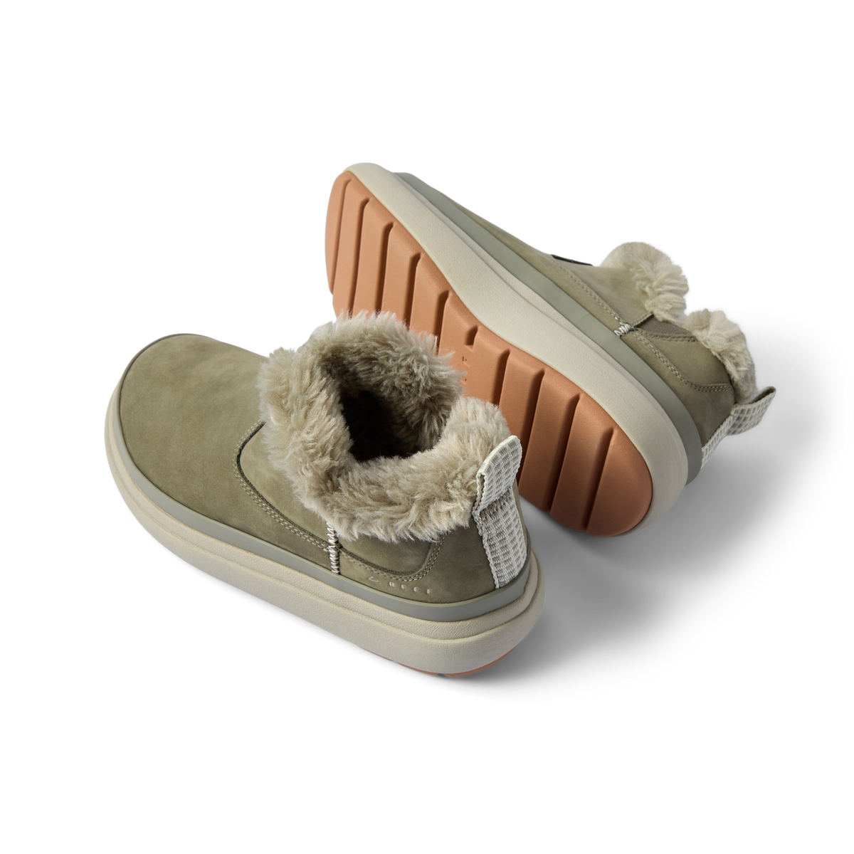 Weekend Olivia women's shoes facing left and right, cozy faux fur lining and durable grippy sole shown in close-up.