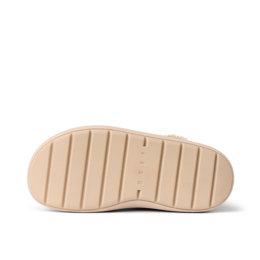 Bottom sole view of Weekend Olivia footwear showing light tan grip with REEF branding, designed for comfort and durability.
