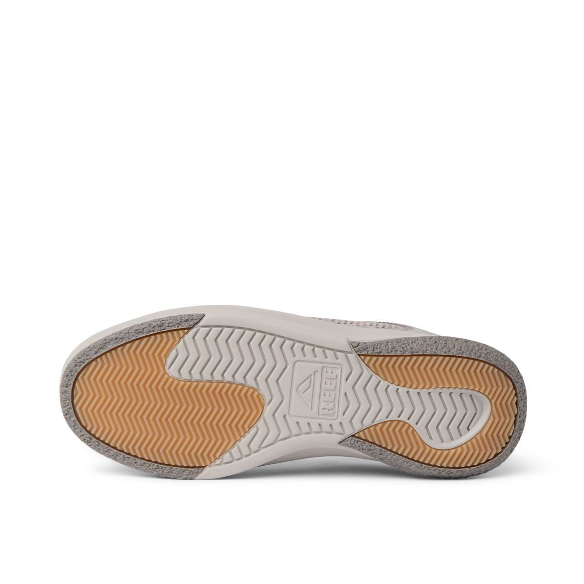 Close up of the Del Mar Leather outsole facing up with the toe pointing left and textured traction for comfort