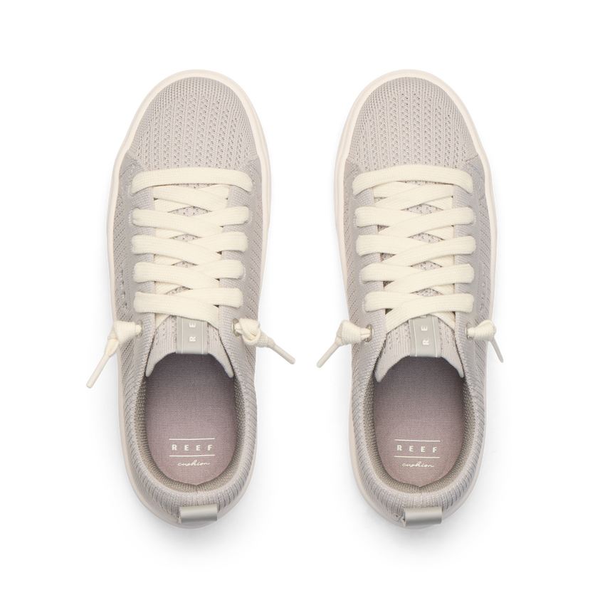 Top view of light gray Lay Day Lite women's sneakers featuring breathable mesh and soft cushioning for beach comfort.