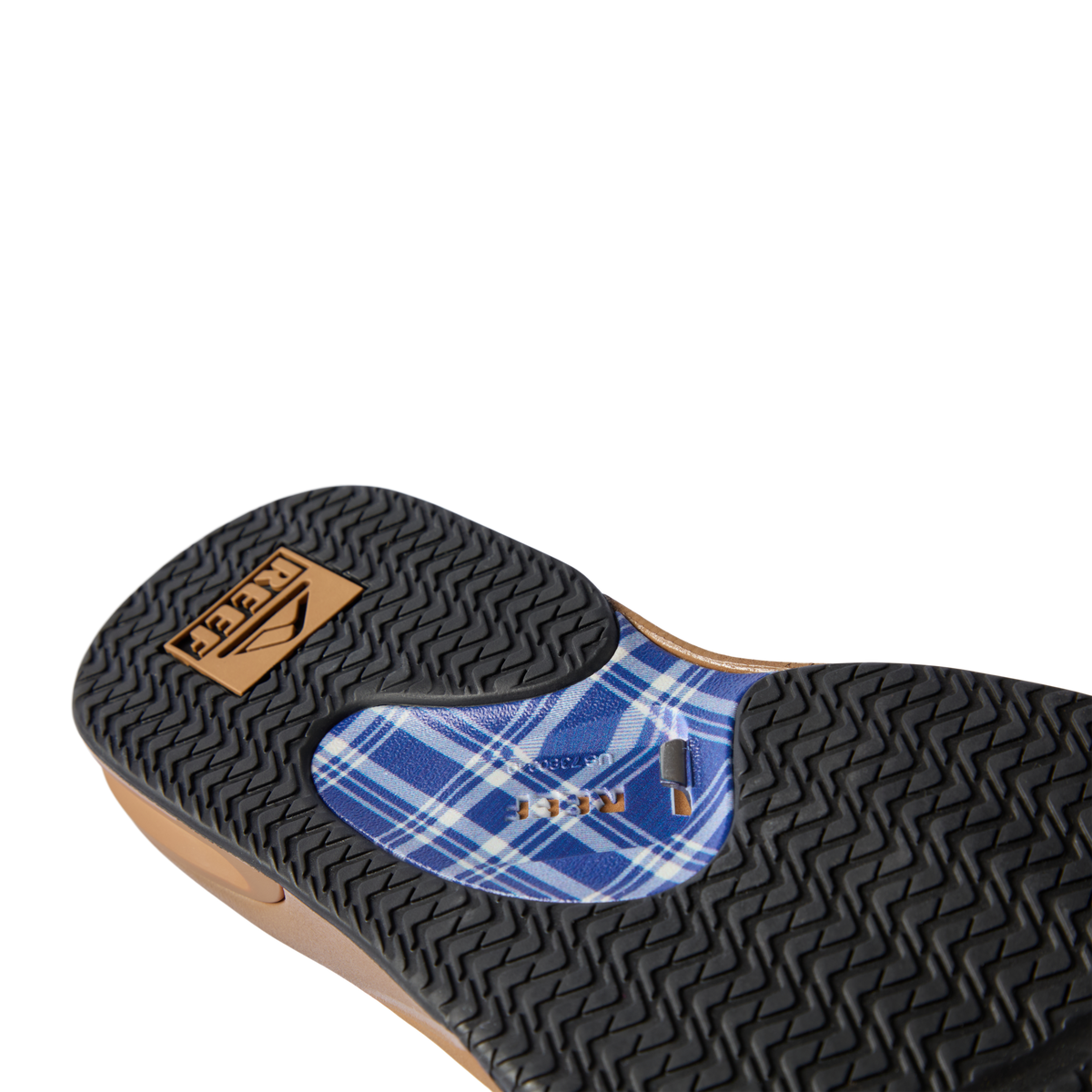 Close-up of the bottom sole of Fanning footwear facing upward, showing water-friendly, durable tread with arch support features.