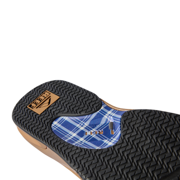 Close-up of the bottom sole of Fanning footwear facing upward, showing water-friendly, durable tread with arch support features.
