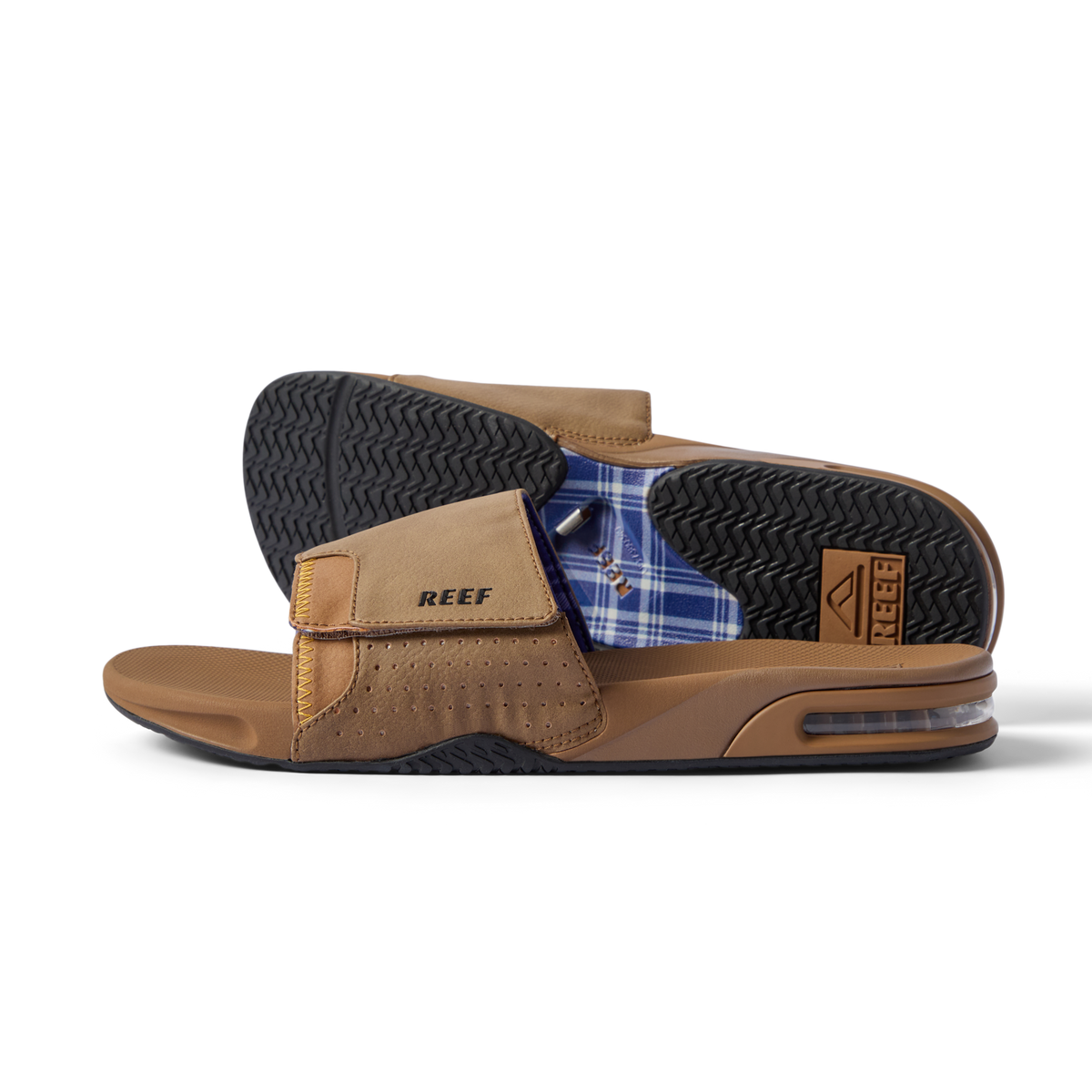Side view of the Fanning Slide showing arch support and water-friendly sole with bottle opener in tan brown color