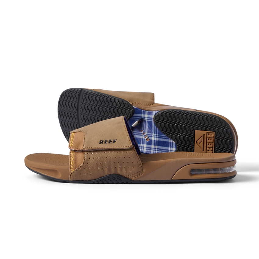 Side view of the Fanning Slide showing arch support and water-friendly sole with bottle opener in tan brown color