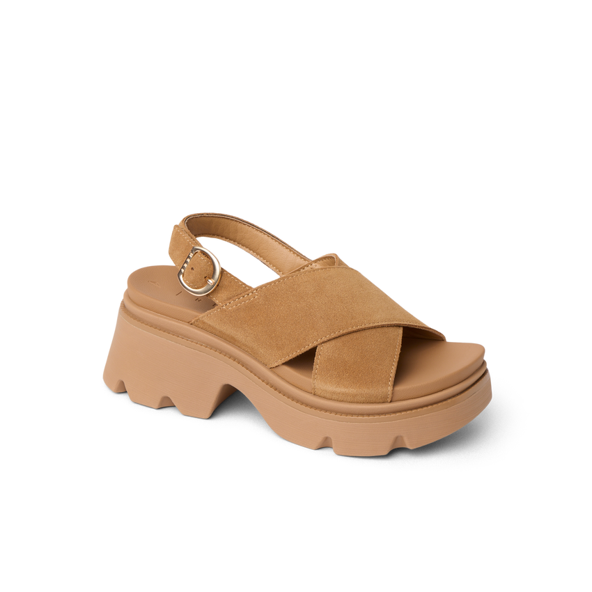 Vista Luxe Ava sandal facing left, close-up of soft suede upper with adjustable crossover strap and cushioned sole.