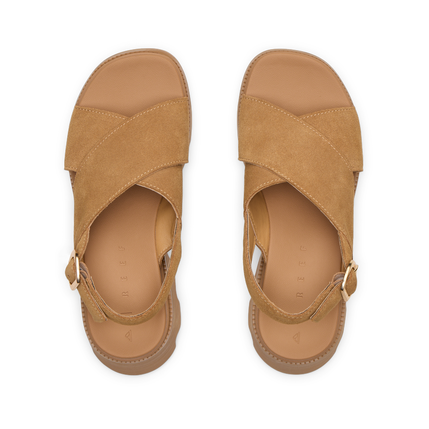 Top view of tan suede Vista Luxe Ava sandals facing up, featuring adjustable straps and cushioned footbeds for arch support.