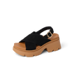 Vista Luxe Ava sandal facing right, black suede crossover strap with cushioned tan platform sole, Arch Support Styles.