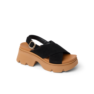 Vista Luxe Ava sandal facing left, featuring black suede crisscross straps and tan cushioned platform sole, arch support style.