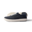 Side view of navy Neptune Lido men's sneaker with white sole, surf-inspired comfort and anatomical arch support.