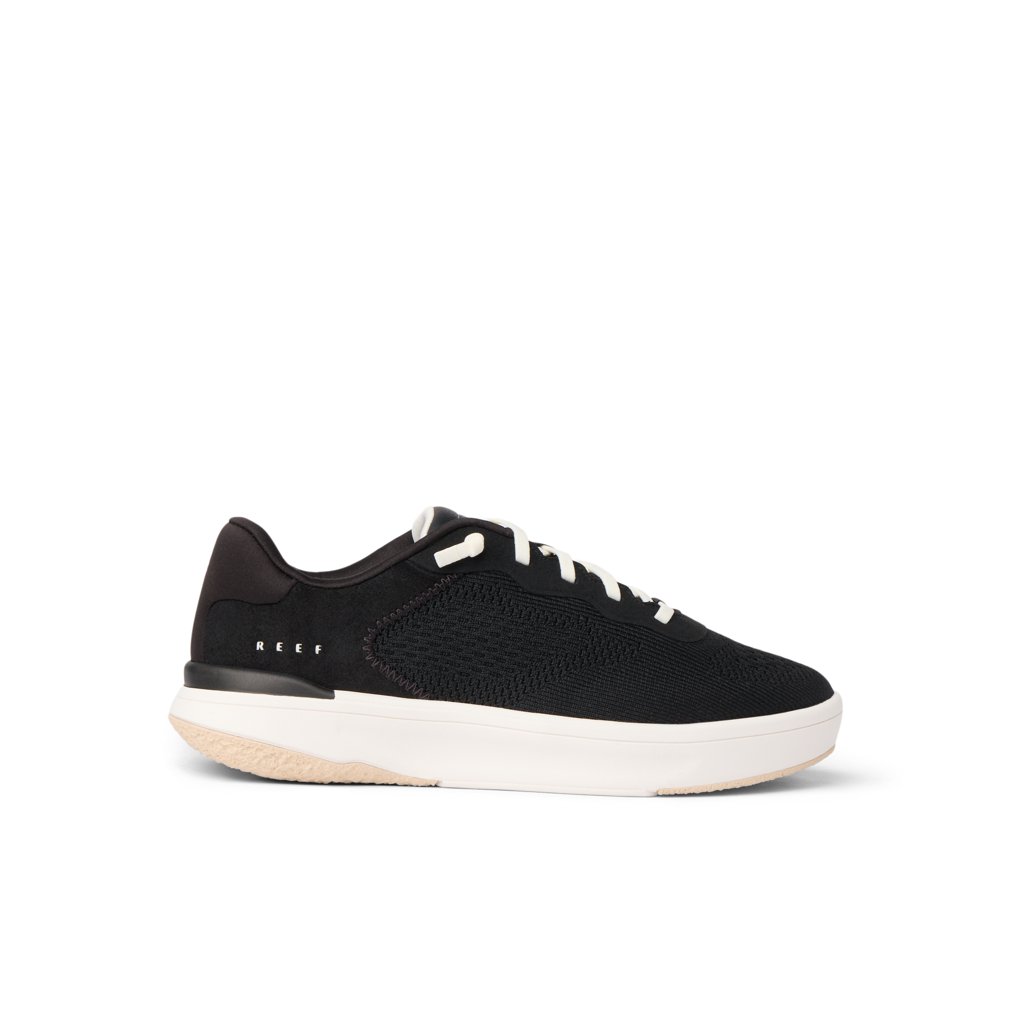 Side view of black Reef Del Mar sneaker with white sole, lightweight and cushioned for beach and everyday comfort.