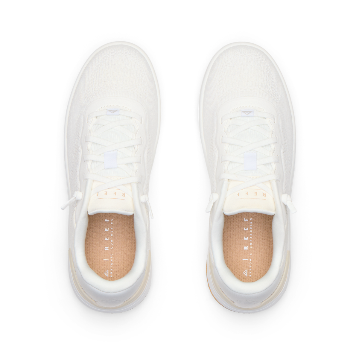 Top-down view of pair of white Reef Del Mar shoes featuring lightweight design and anatomical arch support for comfort.