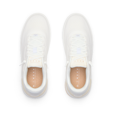 Top-down view of pair of white Reef Del Mar shoes featuring lightweight design and anatomical arch support for comfort.
