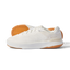 Side view of Reef Del Mar white sneaker with textured breathable upper and tan rubber sole showing grip pattern.
