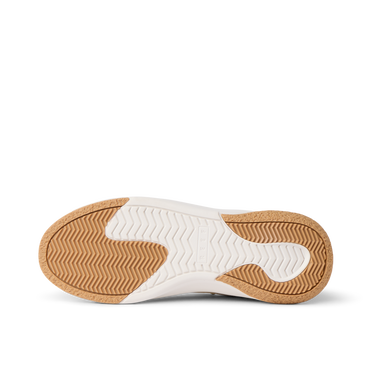 Reef Del Mar shoe outsole close up facing left with textured traction and cushioned support