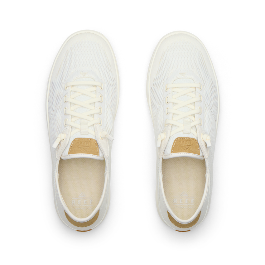 Pair of Laguna shoes facing upward, showing breathable knit upper and lace detail for beach comfort.