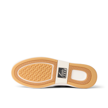 Laguna shoe sole facing up showing REEF logo with textured, durable, beach-inspired design for comfort and grip.
