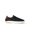 Side view of black Laguna sneaker with breathable upper, cushioned sole, and brown heel tab for beach comfort and durability