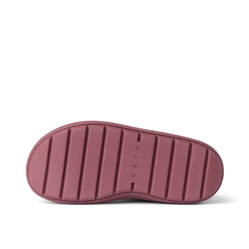 Bottom sole view of the right Weekend Autumn shoe featuring durable, water-friendly material with ridged traction design by REEF.
