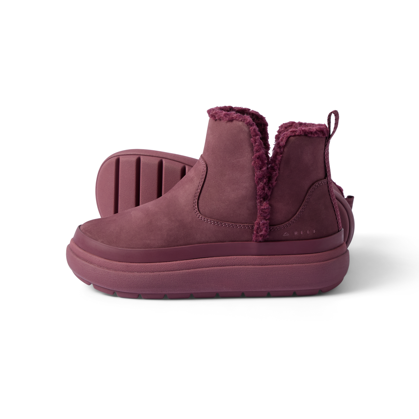 Side view of Weekend Autumn shoe in plum with cozy fleece lining, lightweight sole, and arch support by REEF, facing right.