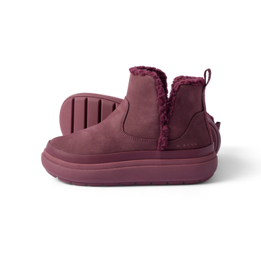 Side view of Weekend Autumn shoe in plum with cozy fleece lining, lightweight sole, and arch support by REEF, facing right.