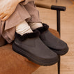 Weekend Olivia black water-resistant boots facing left, cozy faux fur lining, casual comfort for everyday wear by REEF.