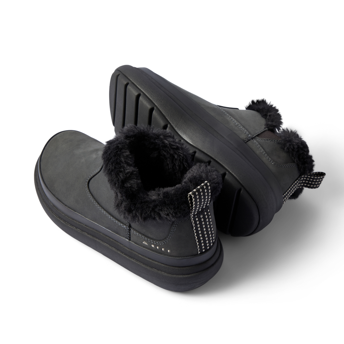 Pair of black Weekend Olivia boots, angled right, showing plush faux fur collar and durable grippy sole.