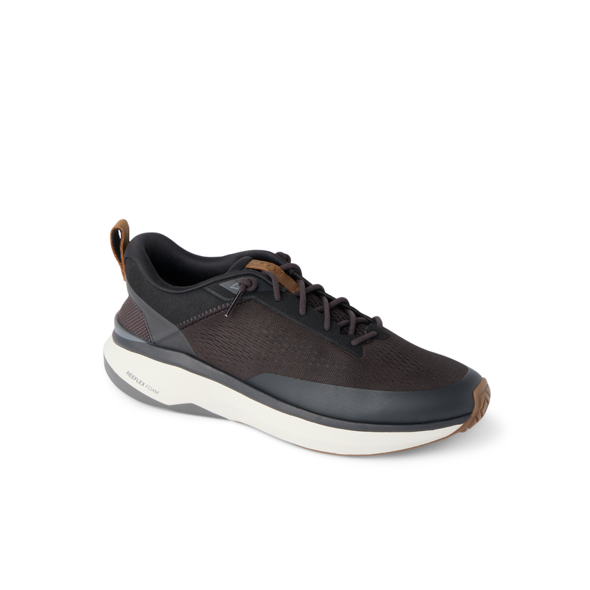 Reef Zuma black athletic sneaker facing right with breathable knit upper and cushioned sole