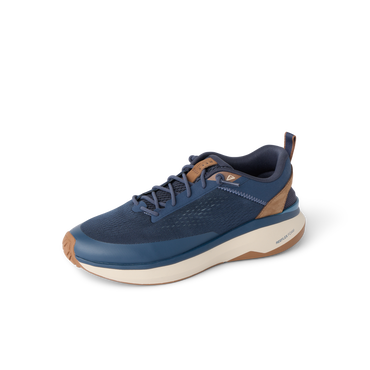 Reef Zuma navy sneaker facing left, featuring a breathable knit upper, padded collar, and cushioned sole