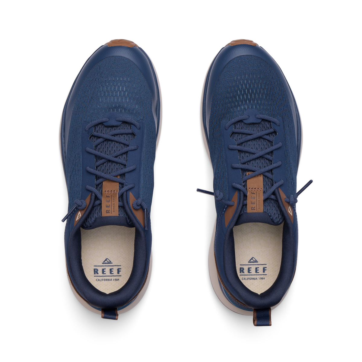 Reef Zuma navy sneakers viewed from above, facing upward, with breathable knit uppers and cushioned footbeds