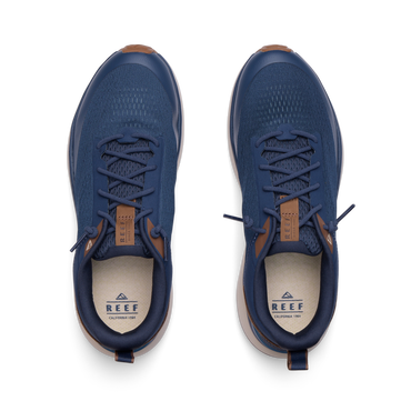 Reef Zuma navy sneakers viewed from above, facing upward, with breathable knit uppers and cushioned footbeds