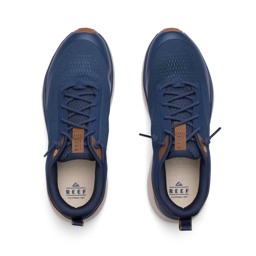 Reef Zuma navy sneakers viewed from above, facing upward, with breathable knit uppers and cushioned footbeds