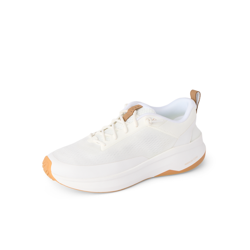 Reef Zuma white sneaker facing left with breathable knit upper and cushioned comfort
