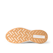 Reef Zuma sneaker outsole facing viewer with toe pointing left and heel right, showing cushioned patterned tread