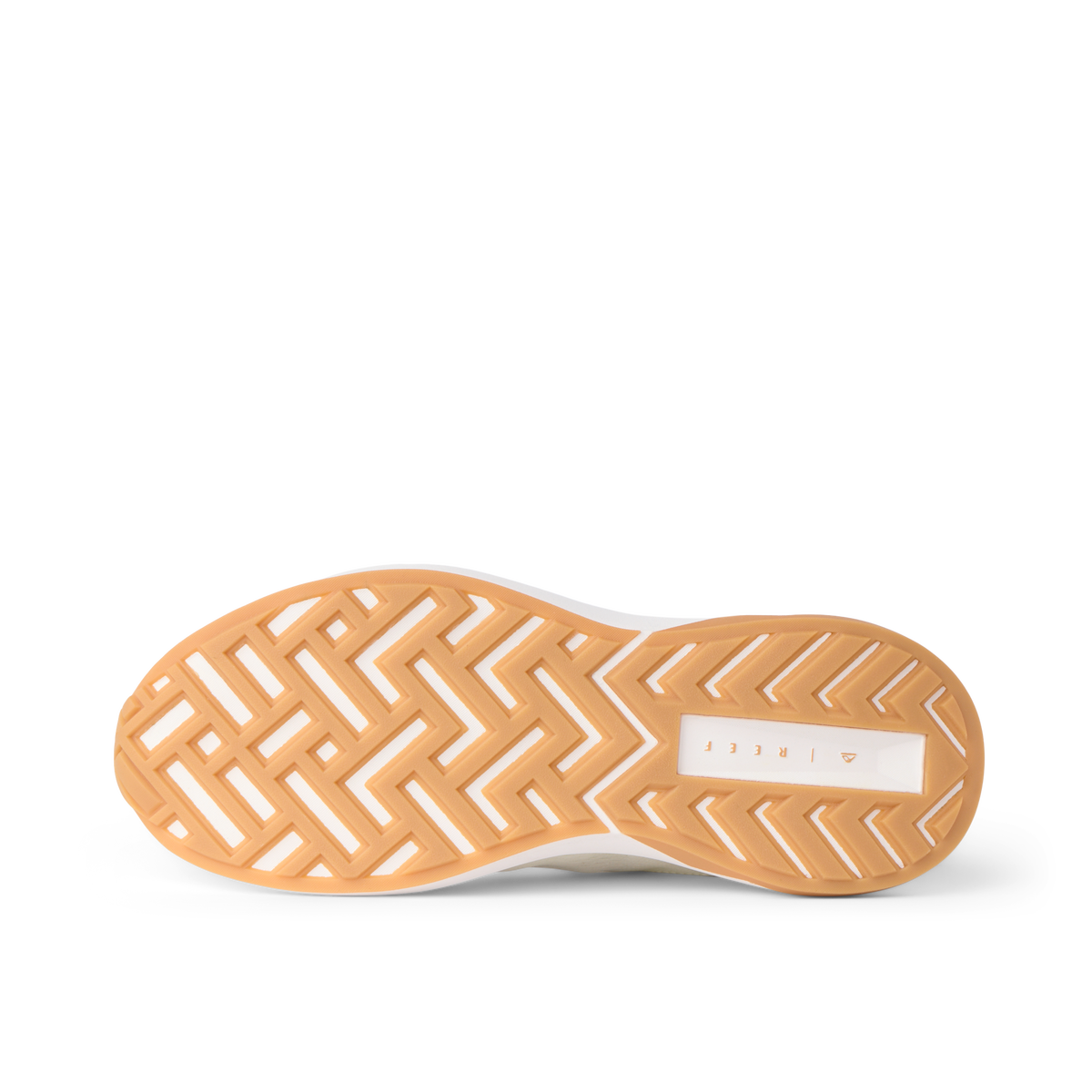 Reef Zuma sneaker outsole facing viewer with toe pointing left and heel right, showing cushioned patterned tread