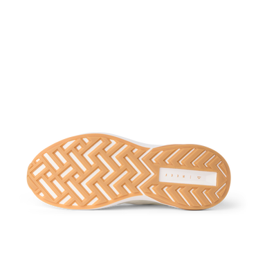 Reef Zuma sneaker outsole facing viewer with toe pointing left and heel right, showing cushioned patterned tread
