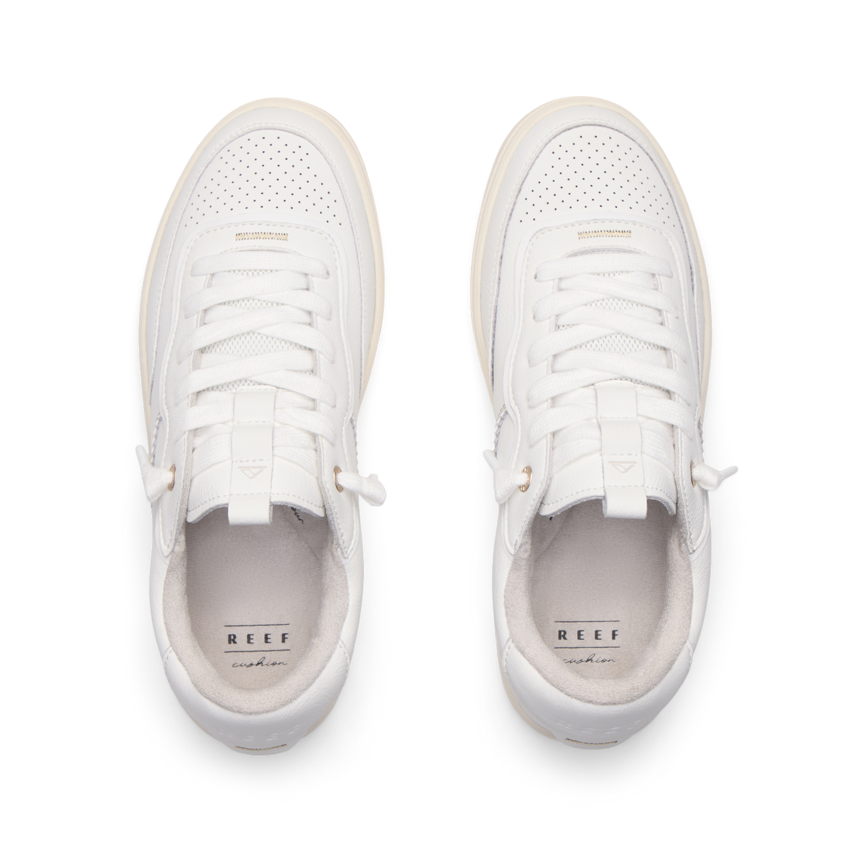 REEF Kickback white sneakers viewed from above facing forward with cushioned footbeds for everyday comfort
