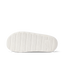 Rambler Kicker sandal sole facing up in off-white with textured grip and REEF logo for durable, lightweight beach comfort