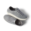 Reef Neptune gray knit sneakers facing opposite directions one toe right and one toe left with cushioned soles