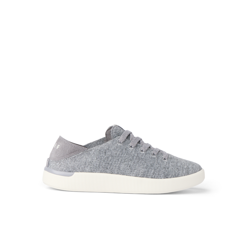 Reef Neptune gray knit sneaker facing right with cushioned sole and collapsible heel