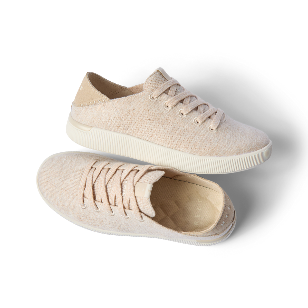 Reef Neptune shoes facing right and left with breathable knit uppers and collapsible heels for everyday comfort