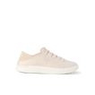 Cream lace up sneaker facing right on a black background